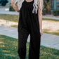 Black Spaghetti Straps Wide Leg Pocketed Jumpsuits